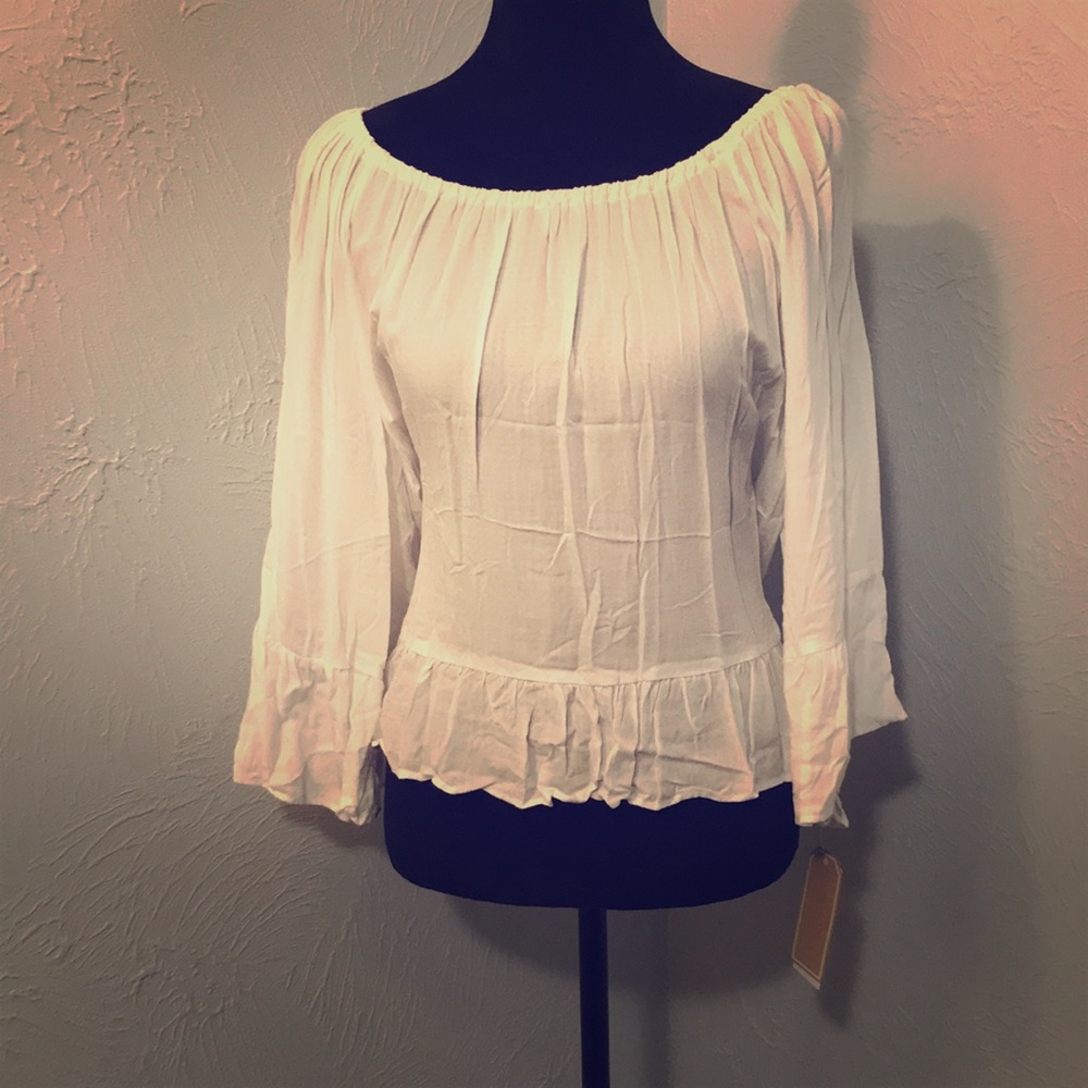White bell sleeved blouse